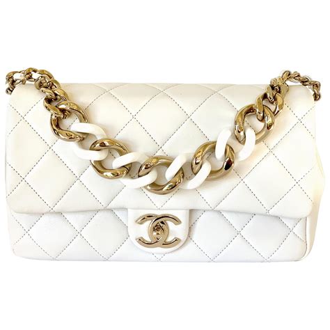 do chanel bags have real gold|Chanel bag with gold chain.